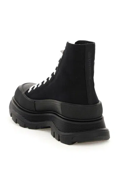 Shop Alexander Mcqueen Tread Slick Boots In Nero