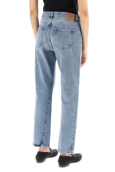 Shop Totême Twisted Seam Cropped Jeans In Blu
