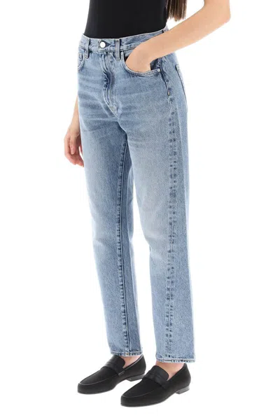Shop Totême Twisted Seam Cropped Jeans In Blu