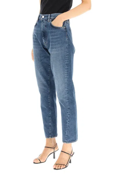 Shop Totême Twisted Seam Slim Jeans In Blu