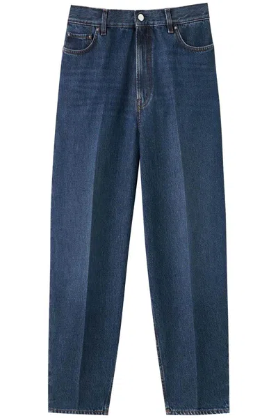 Shop Totême Wide Tapered Jeans In Blu