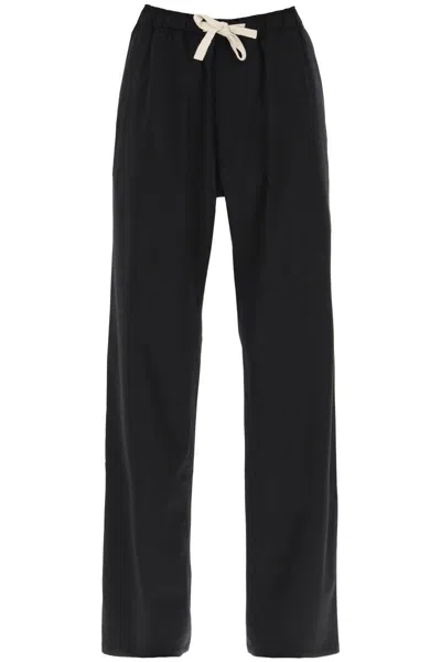 Shop Palm Angels Wool Blend Travel Pants In Nero