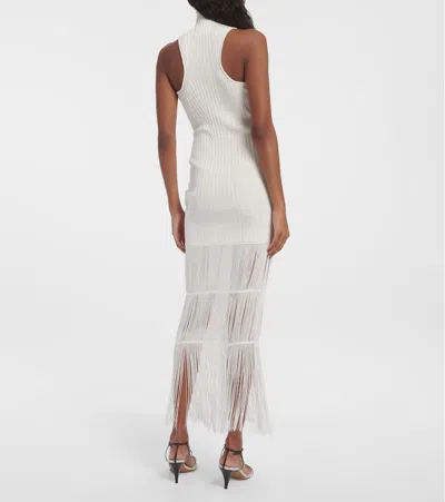 Shop Khaite Zare Fringed Ribbed-knit Maxi Dress In Weiss