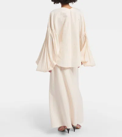Khaite Quico Balloon-sleeve Oversized Silk Blouse In Beige