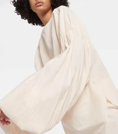 Khaite Quico Balloon-sleeve Oversized Silk Blouse In Beige