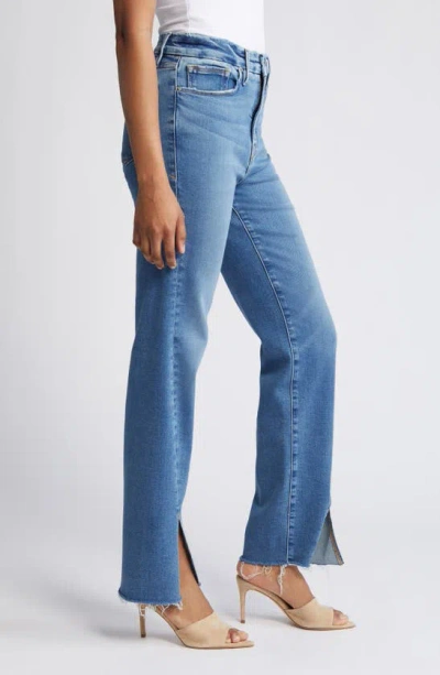 Good American Good Boy Twisted Slit Raw Hem Jeans In Indigo584