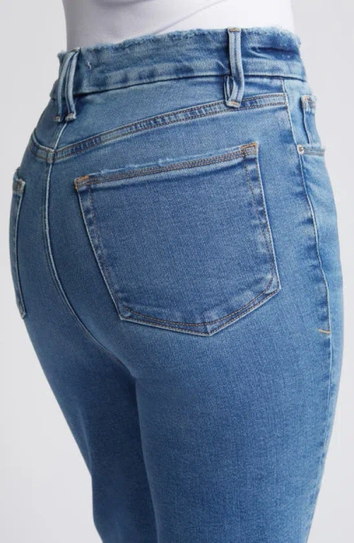 Good American Good Boy Twisted Slit Raw Hem Jeans In Indigo584