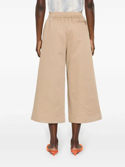 Shop Loewe Wrapped Cropped Trousers In Beige