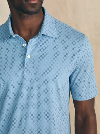 Shop Faherty Movement&trade; Short-sleeve Pique Polo Shirt In Blue Surfboard Geo