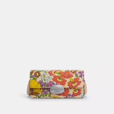 Shop Coach Outlet Eliza Small Flap Crossbody With Floral Print In Multi