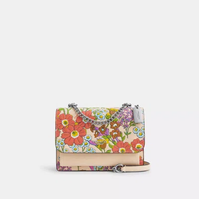 Shop Coach Outlet Klare Crossbody Bag With Floral Print In Multi