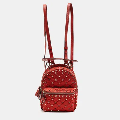 Shop Valentino Quilted Nylon And Leather Mini Rockstud Spike Backpack In Red