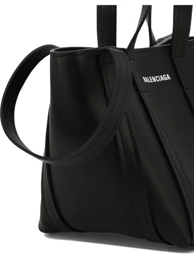 Shop Balenciaga "everyday Xs North-south" Crossbody Bag In Black