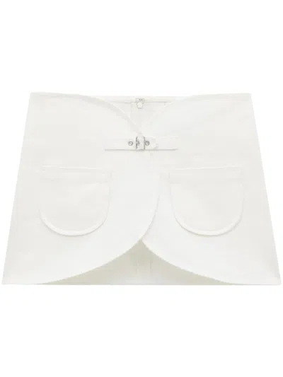 Shop Courrèges Denim Miniskirt With Ellipse Buckle In White