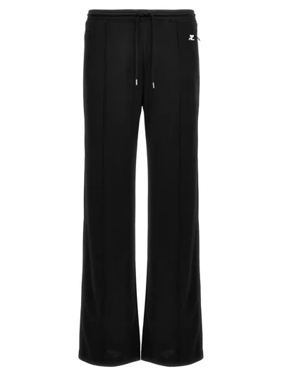 Shop Courrèges 'tracksuit Interlock' Pants In Black