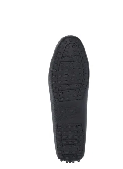 Shop Tod's Flat Shoes Black