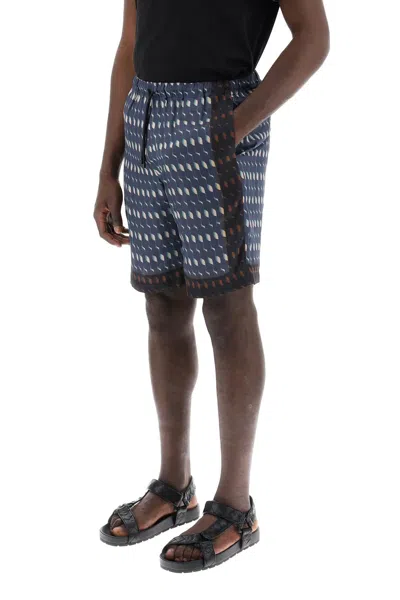 Shop Dries Van Noten S-wave Printed Bermuda Shorts Men In Blue