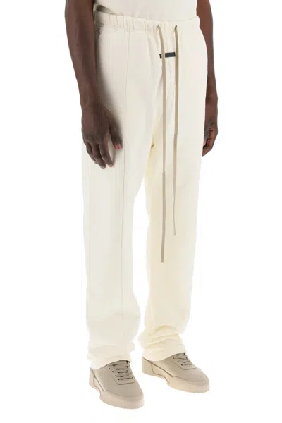 Shop Fear Of God "brushed Cotton Joggers Forum Men In Cream