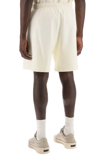 Shop Fear Of God Cotton Terry Sports Bermuda Shorts Men In Cream