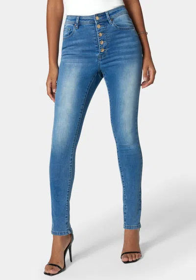 Shop Bebe Skinny High Waist Denim With Multi Front Buttons In Medium Sky Blue