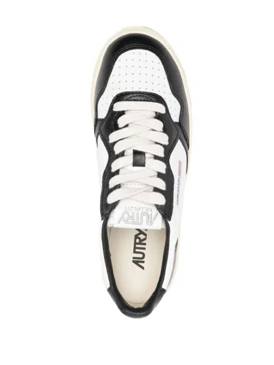 Shop Autry Platform Low Leather Sneakers In Black