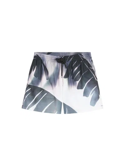 Shop Dries Van Noten Fitted Swim Shorts With A Giant Watercolor Palm Tree Print. In Blue