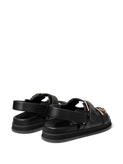Shop Jimmy Choo Elyn Flat Leather Sandals In Black