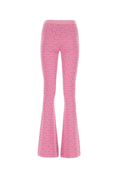 Shop Versace Pants In Pinkfuxia
