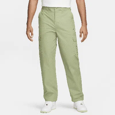 Shop Nike Men's Club Cargo Pants In Green