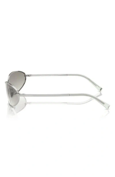 Shop Prada 59mm Oval Sunglasses In Silver