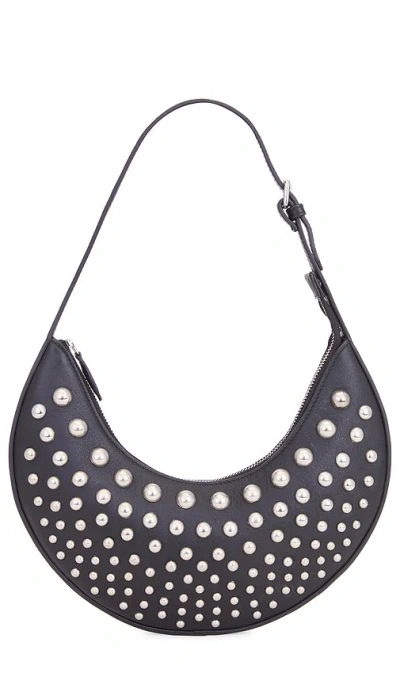 Shop Understated Leather Studded Moon Bag In Black