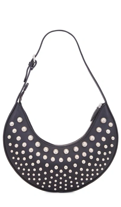 Shop Understated Leather Studded Moon Bag In Black