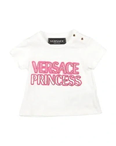 Shop Versace Young Newborn Girl T-shirt White Size 3 Cotton