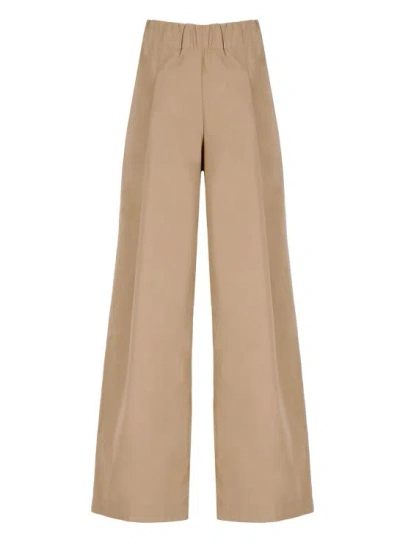Shop Dries Van Noten Beige Cotton Trousers In Brown