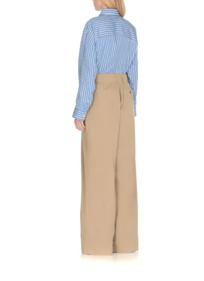 Shop Dries Van Noten Beige Cotton Trousers In Brown