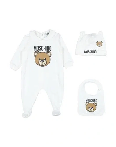 Shop Moschino Baby Newborn Baby Accessories Set White Size 3 Cotton