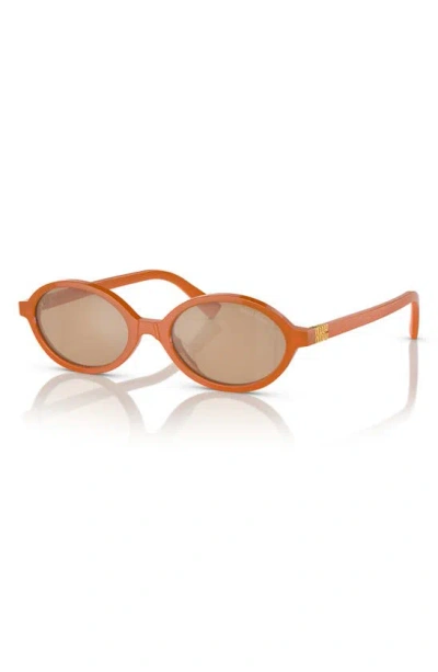 Shop Miu Miu 50mm Oval Sunglasses In Orange