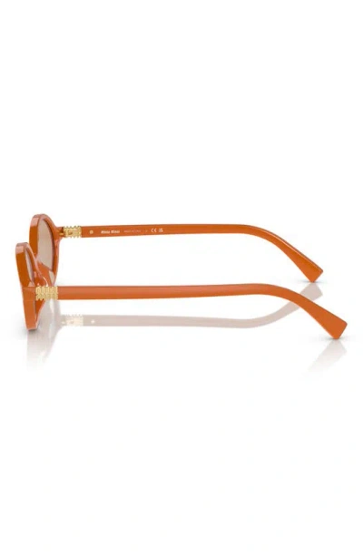 Shop Miu Miu 50mm Oval Sunglasses In Orange