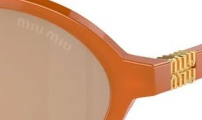 Shop Miu Miu 50mm Oval Sunglasses In Orange