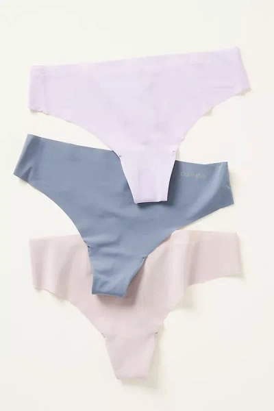 Shop Calvin Klein Invisibles Thong Underwear, Set Of 3 In Purple