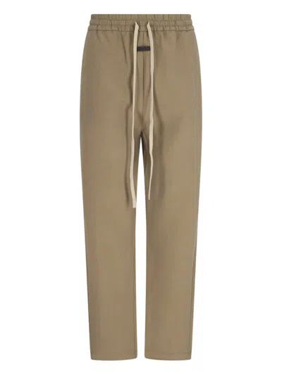 Shop Fear Of God Logo Patch Drawstring Trousers In Brown
