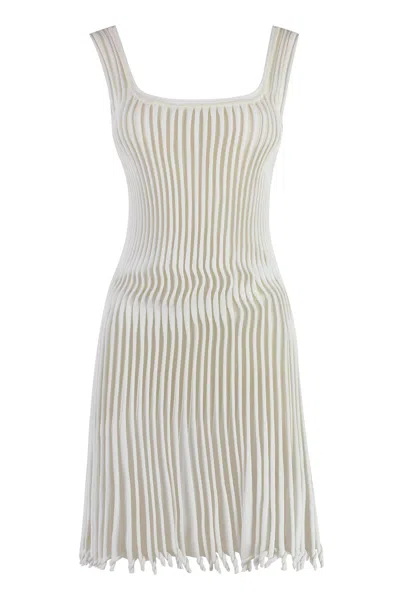 Shop Alaïa Knitted Dress In White