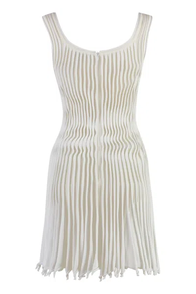 Shop Alaïa Knitted Dress In White