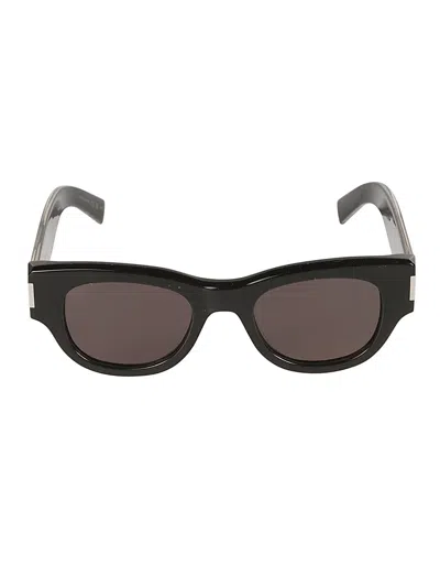 Shop Saint Laurent Round Frame Sunglasses In Black/crystal/grey