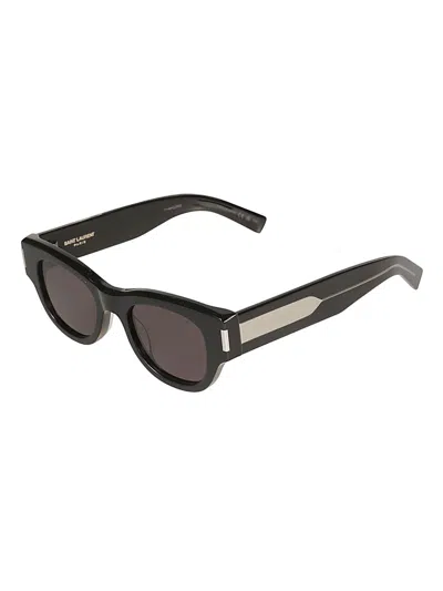 Shop Saint Laurent Round Frame Sunglasses In Black/crystal/grey