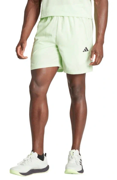 Shop Adidas Originals Tr-es 3-stripes Running Shorts In Semi Green Spark/ Black