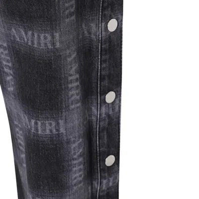 Shop Amiri Trousers In Black/aged