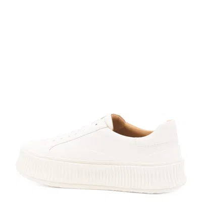 Shop Jil Sander Sneakers Beige