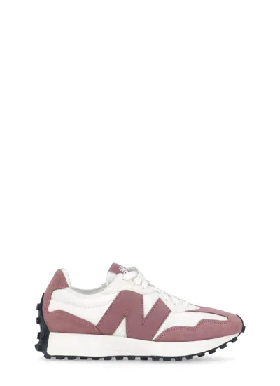Shop New Balance Sneakers Pink