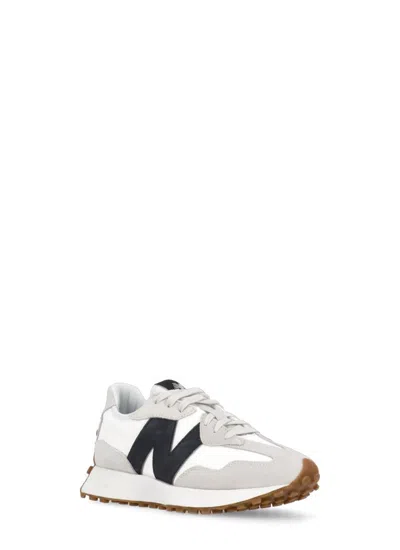 Shop New Balance Sneakers Ivory